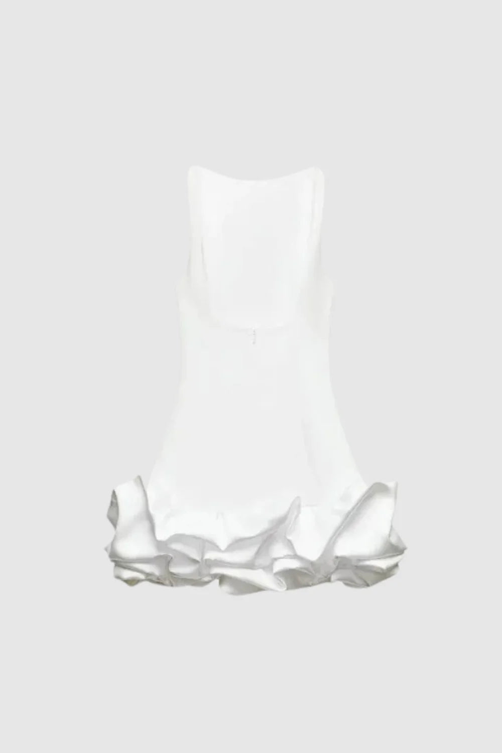 Model wearing Kouvr Fashion's white sleeveless bubble hem mini dress