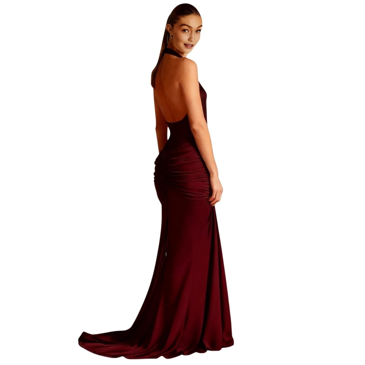Woman wearing a burgundy Kouvr evening gown on a white background