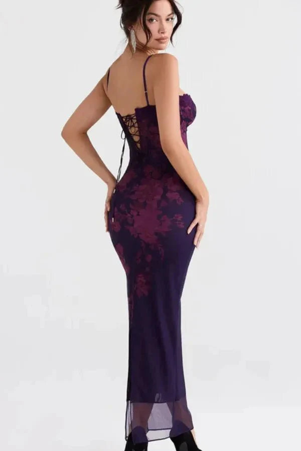 Model wearing Kouvr shaira purple floral corset maxi dress with lace trim for a formal event