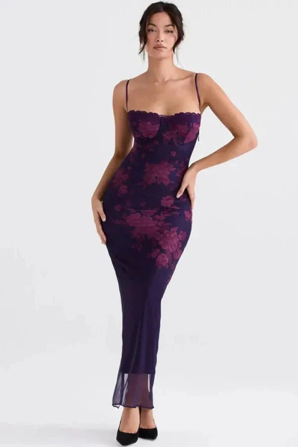 Model wearing Kouvr shaira purple floral corset maxi dress with lace trim for a formal event
