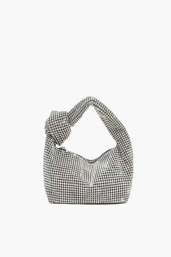 Houndstooth patterned Kouvr handbag on a white background