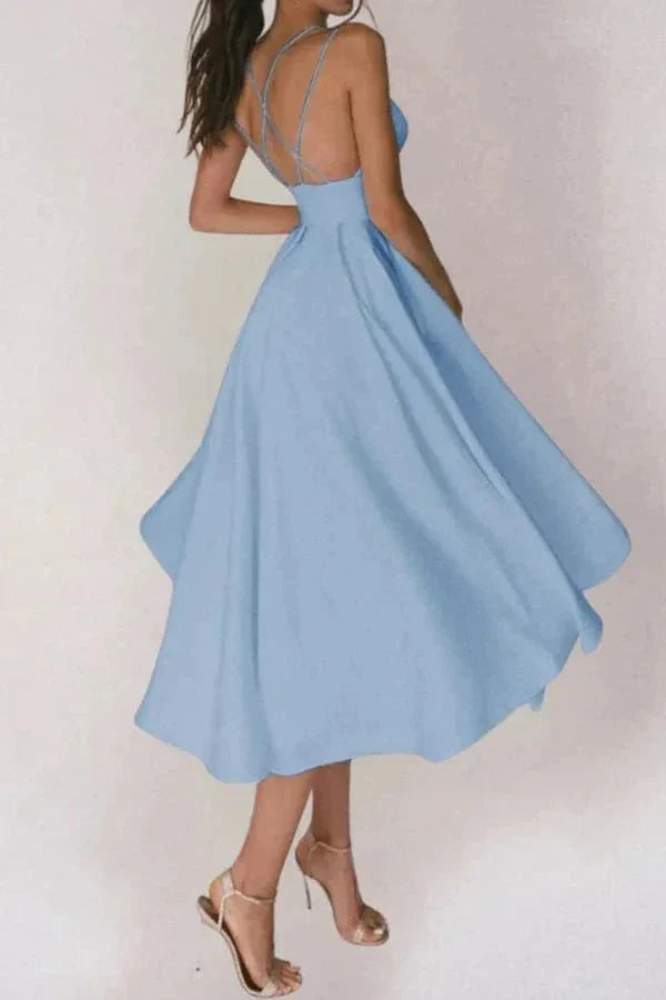 Weave semantically related terms throughout the description: "elegant silhouette," "flowing skirt," "sophisticated attire," "ceremony guest," "reception dress," and "special occasion