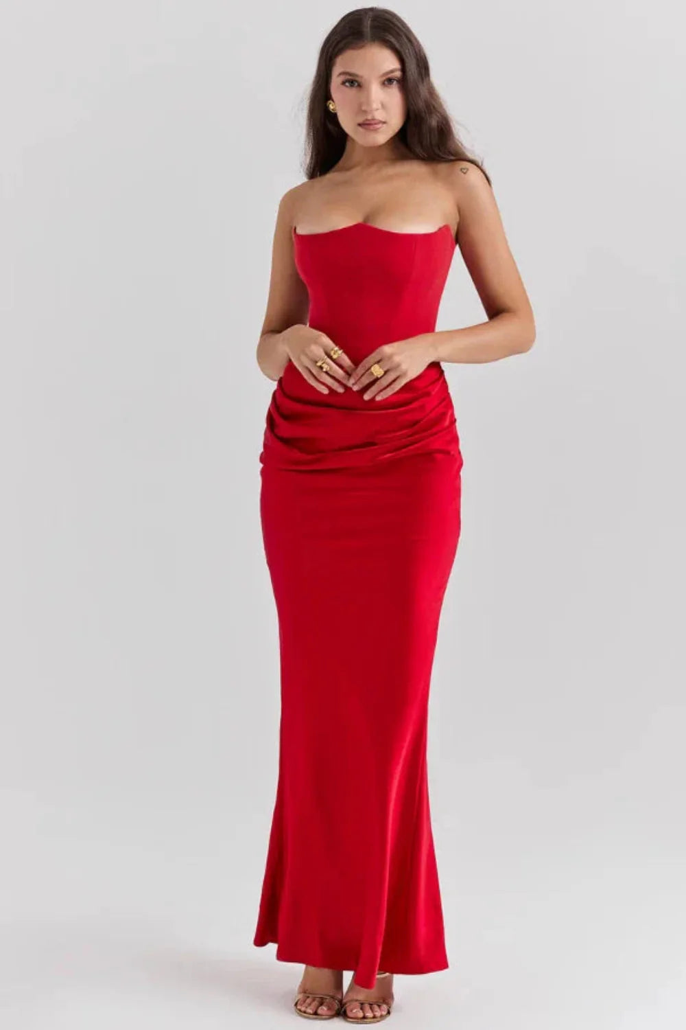 structured bodice," "draped silhouette," "bustier," "formal wear," and "black-tie attire