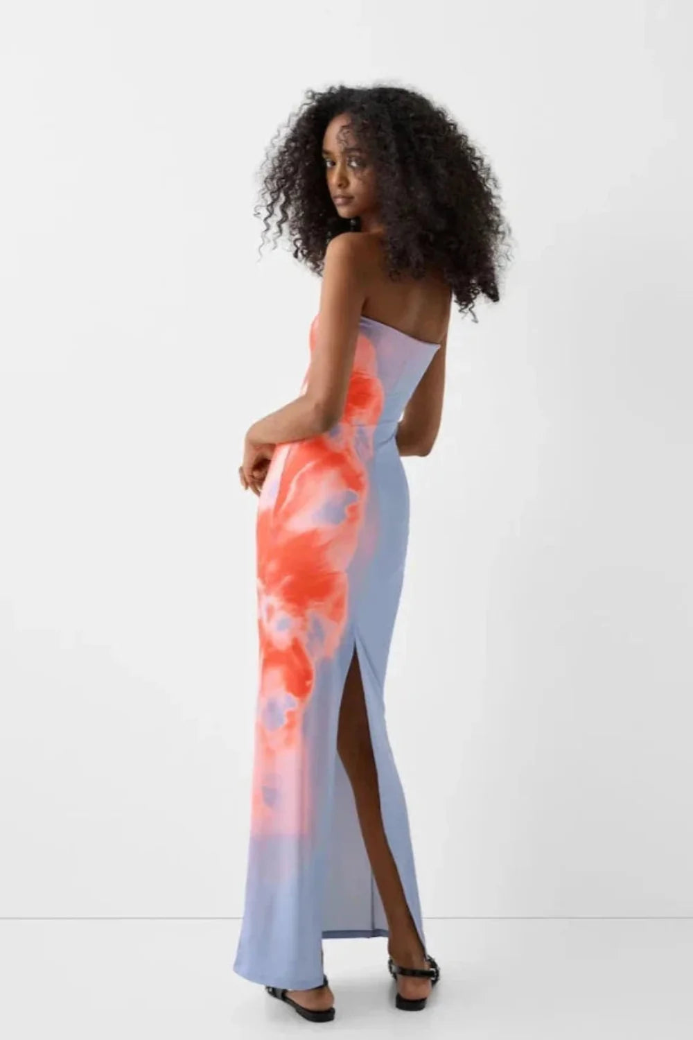 sculpting," "silhouette," "artistic," "vibrant hues," "resort-ready," "evening affair," "statement piece," "stretch-jersey," and "ankle-length