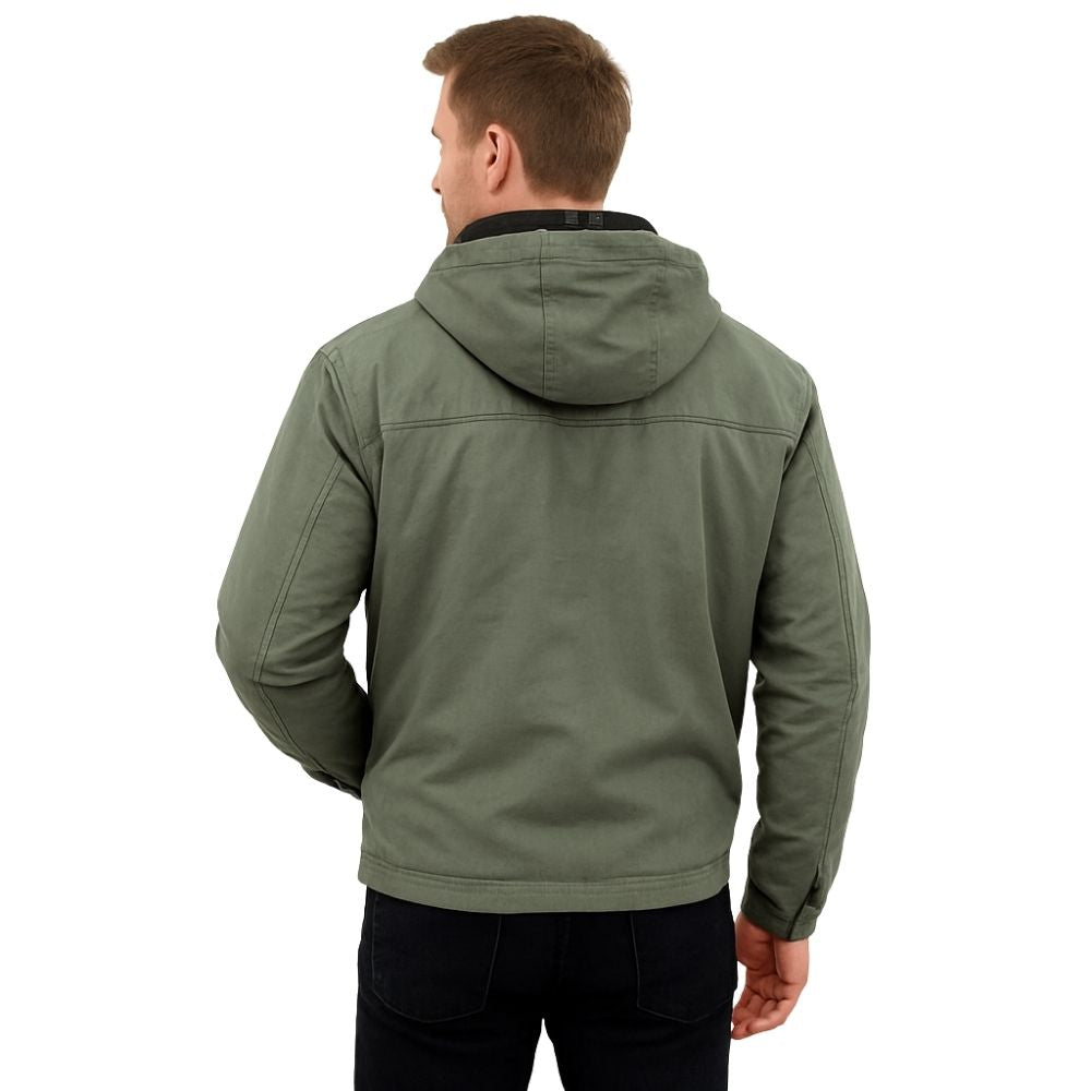 Man wearing the Kouvr tyrian sherpa-lined olive green canvas hooded jacket, facing back with hands in pockets.