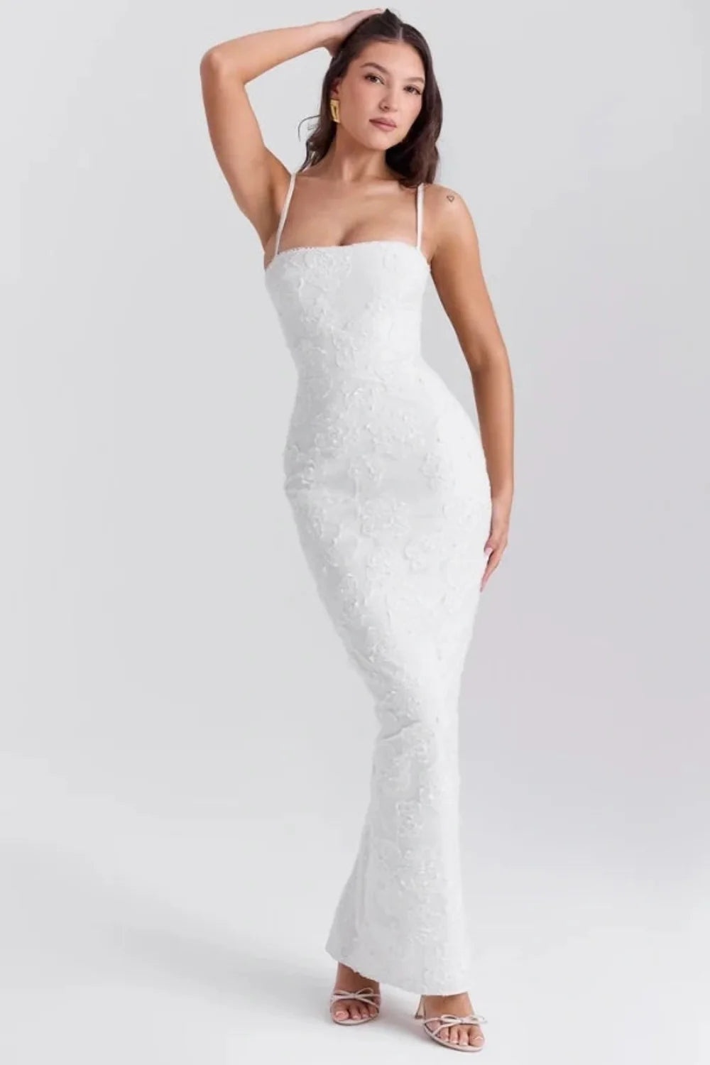 sculptural silhouette," "couture detailing," "ethereal elegance," "minimalist bride," "civil ceremony attire," and "rehearsal dinner outfit