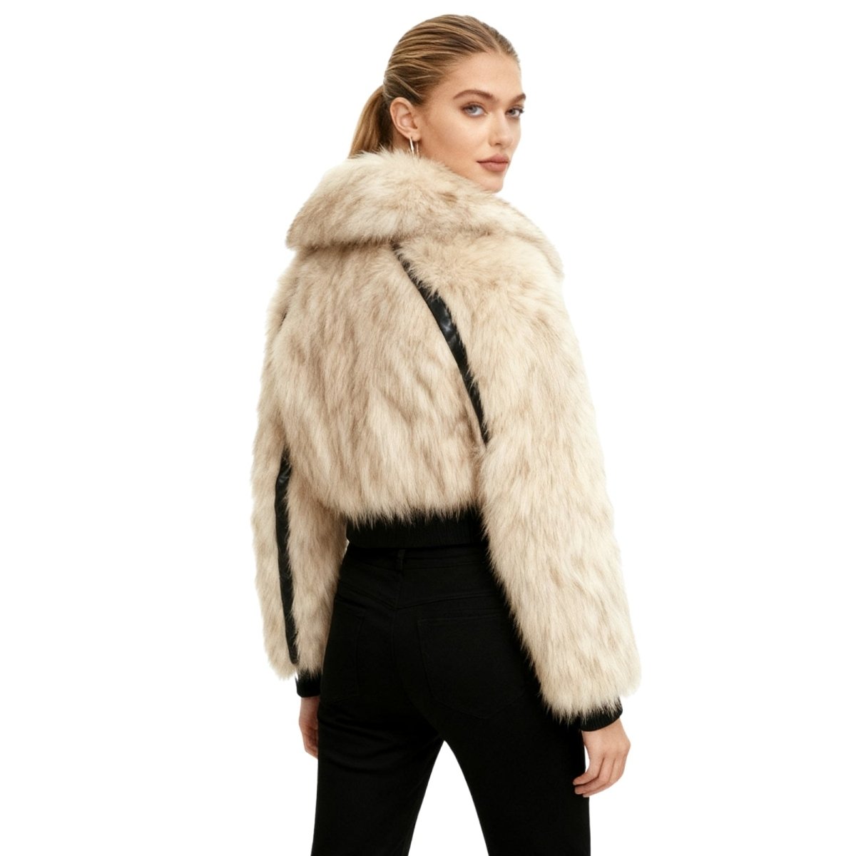 Woman wearing a beige Kouvr fur jacket on a white background