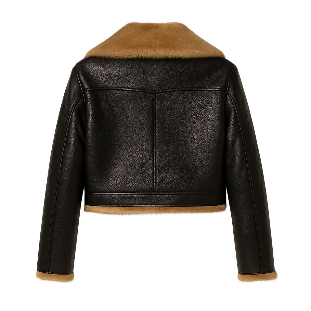 Woman wearing Kouvr Fashion black cropped faux leather aella jacket with brown faux shearling fur collar