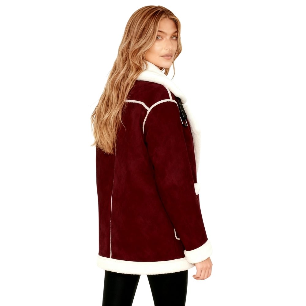 Woman wearing a Burgundy and white Kouvr jacket on a white background