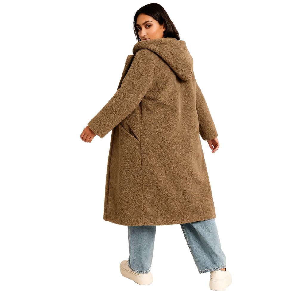 bouclé texture," "double-breasted tailoring," "investment outerwear," "fall essentials," and "longline silhouette