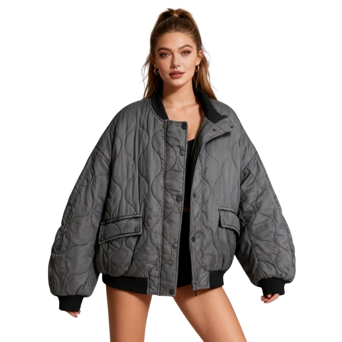 Kouvr women's oversized quilted bomber jacket in vintage charcoal gray, front view on model.