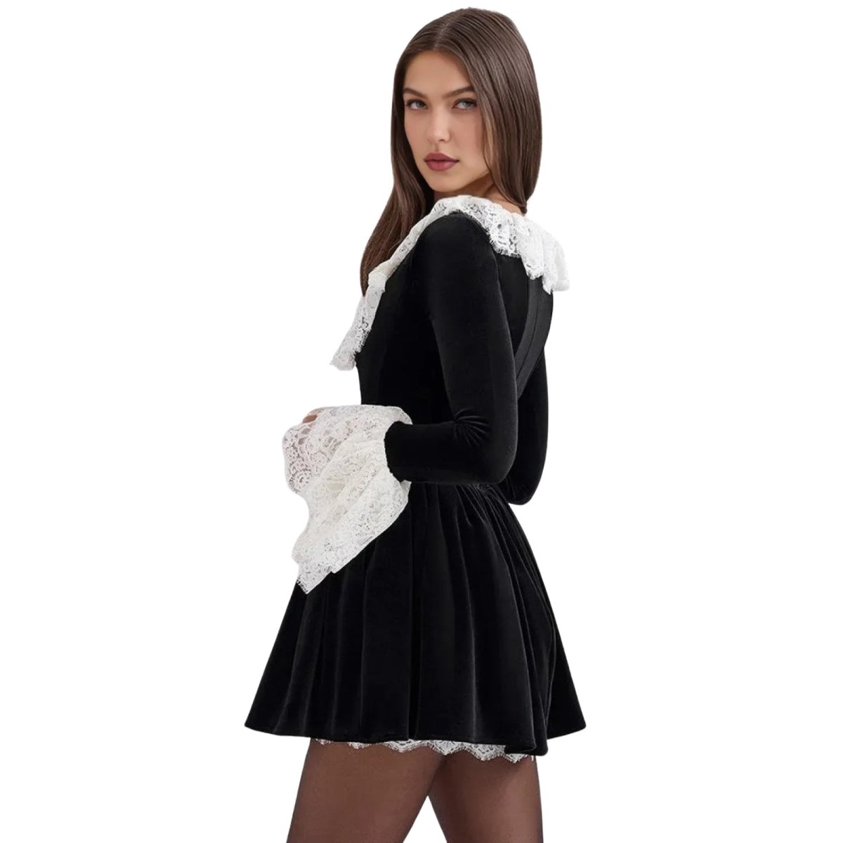 Side view of the Kouvr Fashion Zinnia gothic coquette dress showing the flared skirt and long sleeves.