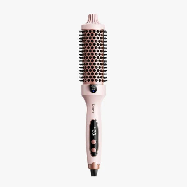 Pink Kouvr thermal brush with rose gold ceramic barrel and digital temperature display showing 420 degrees for creating frizz-free volume.